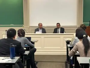 Vishal Chander and Hasan Shafiqullah speaking at AABANY immigration enforcement CLE at NYU School of Law in March 2026